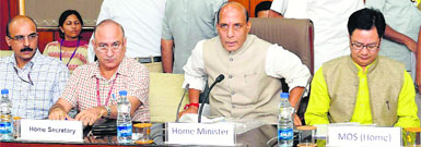 Union Home Minister Rajnath Singh at a meeting with Chief Secretaries and DGPs of the Maoist-affected states in New Delhi on Friday. Minister of State for Home Kiren Rijiju and Home Secretary Anil Goswami are also seen.