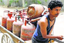 An LPG vendor in New Delhi on Tuesday. Tribune photo