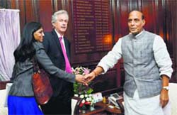 Union Home Minister Rajnath Singh shakes hands with US Assistant Secretary of State for South and Central Asian Affairs Nisha Biswal as US Deputy Secretary of State William Joseph Burns looks on at a meeting in New Delhi on Thursday