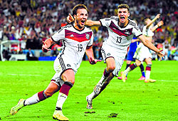 Germany's Mario Gotze (L) celebrates after scoring a goal during extra time in the 2014 World Cup final against Argentina in Rio de Janeiro on Sunday