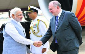 Prime Minister Narendra Modi being welcomed at the airport by chief coordinator of BRICS and the Brazilian Foreign Minister Louise Lopes at Fortaleza in Brazil on Monday