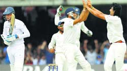 Ishant Sharma celebrates the dismissal of Englands Stuart Broad during the second test at Lord's on Monday. pti