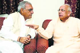 Haryana Governor-designate Kaptan Singh Solanki (R) with CM Bhupinder Singh Hooda in New Delhi