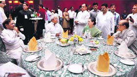 Congress president Sonia Gandhi with RJD chief Lalu Yadav (C) and JD(U) leader Sharad Yadav at an Iftar party in New Delhi
