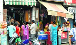 People buy essential commodities after curfew was relaxed in in Saharanpur on Monday. A Tribune Photograph