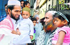BONHOMIE: Families greet each other on the occasion of Eid in Ludhiana on Tuesday