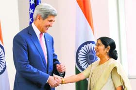 US Secretary of State John Kerry (L) shakes hands with Minister for External Affairs Sushma Swaraj during a meeting in New Delhi