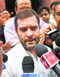 Rahul Gandhi speaks to the media outside Parliament.