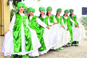 Students present a dance during the 33rd Foundation Day of Spring Dale School