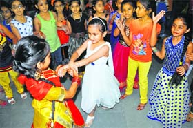 Students of DAV Public School celebrate Teej on its premises in Ludhiana