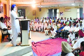 A speaker expresses his views at the convention in Ludhiana