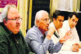 Members of the Punjab Spinners Association deliberate on tax disadvantage during a meeting in Ludhiana on Wednesday