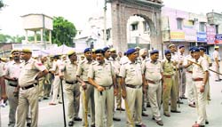 Policemen stand guard outside gurdwara Chhevin Patshahi in Kurukshetra.