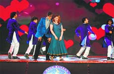 Fun times: Host Amitabh Bachchan opened the new season in his inimitable style