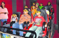 Fantasy world: Children enjoying at a multi-dimensional theatre