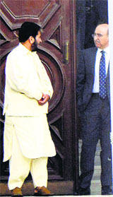 Pakistani High Commissioner Abdul Basit with J-K separatist leader Shabir Shah in New Delhi on Monday