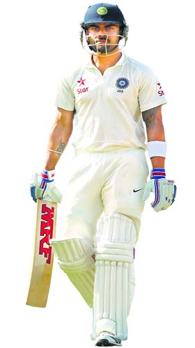 Virat Kohli walks back to the pavilion