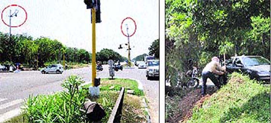 Mast headlights at the Sector 45/46/49/50 intersection are missing or broken. The MC has even failed to replace the boken pole of one of the mast headlights near the spot where the fatal accident took place; and (right) an employee of the horticulture wing cuts wild growth near the intersection.