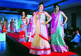BEauty quotient: Models walk the ramp during the Mrs North India-2014 contest organised in Sector 10, Panchkula, on Monday.