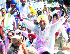 SAD-BJP candidate Jeet Mohinder Singh celebrates with supporters at Talwandi Sabo on Monday.