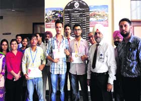 Dr MS Pabla (second from right), director, RIMT Academic College, gives away certificates and medals to the winners of a chess tournament held in college