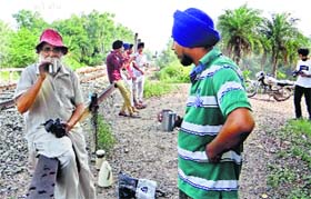 Photographer Janmeja Johal (left) and others during their visit to Tar Forest
