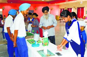 Students of GNIPS display models during a science exhibition on the school campus in Ludhiana