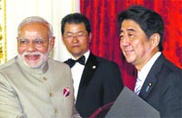 Prime Minister Narendra Modi with his Japanese counterpart Shinzo Abe at Akasaka State Guest House in Tokyo on Monday. AFP