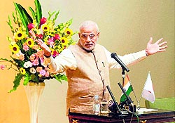 PM Narendra Modi deliveres a lecture at the University of Sacred Heart in Tokyo on Tuesday