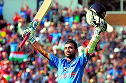 Ajinkya Rahane celebrates his ton during the fourth ODI against England in Birmingham