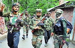 Army jawans at the scene of the encounter at Hanjan village in south Kashmirs Pulwama district