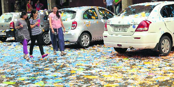 Party stickers strewn around at the Department of Law at Panjab University on Friday.