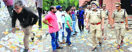 Panjab University Vice-Chancellor AK Grover takes a round of the campus; and (right) police officials keep vigil on the campus on Friday.