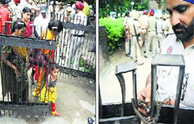 (Right) A policeman locks the gate of the Juvenile Jail complex; and relatives of the jail inmates come out of the complex after the protest by anganwadi workers in Ludhiana on Thursday