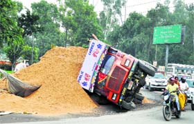 Off road: A truck that overturned at Cheema Chowk in Ludhiana on Thursday