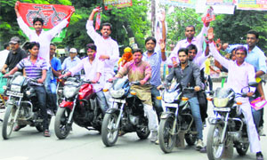 SP workers celebrate their party's victory in Allahabad on Tuesday.