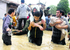 Flood victims being rescued in the Valley on Tuesday.