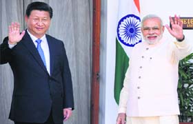 Chinese President Xi Jinping with Prime Minister Narendra Modi during a meeting at Hyderabad House in New Delhi on Thursday