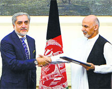 Afghan presidential candidates Abdullah Abdullah (L) and Ashraf Ghani Ahmadzai in Kabul on Sunday