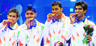 Saurav Ghosal, Harinder Pal Singh Sandhu, Mahesh Mangaonkar and Kush Kumar with their squash gold in Incheon on Saturday.