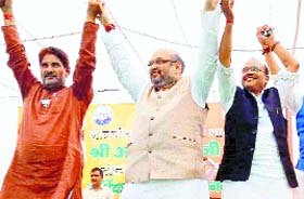 BJP president Amit Shah along with party workers at a public meeting in Tohana, Haryana, on Monday