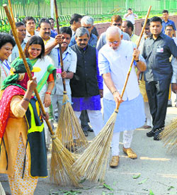 PM Narendra Modi launches the Swachh Bharat mission from Valmiki Basti in New Delhi on Thursday.