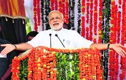 Prime Minister Narendra Modi addresses the Haryana Vijay Sankalp Rally in Karnal on Saturday.