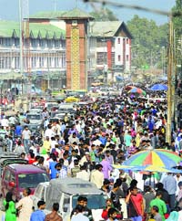 Residents throng Lal Chowk ahead of Eid in Srinagar on Sunday.