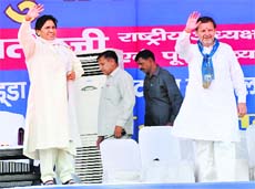 BSP chief Mayawati with partys chief ministerial candidate for Haryana Arvind Sharma at a rally in Karnal on Sunday