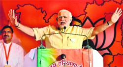 PM Narendra Modi addresses a rally in Gurgaon on Saturday.