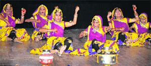 Girls present a traditional dance during "Anjuman - 2014" at the Bal Bhawan, Sector 23, in Chandigarh on Thursday.