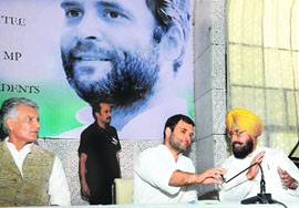AICC V-P Rahul Gandhi has a word with Punjab Congress chief Partap Singh Bajwa in Chandigarh.
