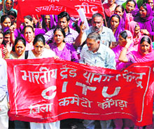 Trade unionists hold a protest.
