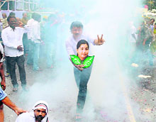 Jaya supporters celebrate after SC gave her bail